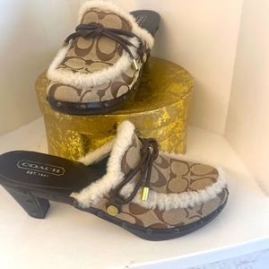 Coach clogs with fur enhancements. Size 7.5.